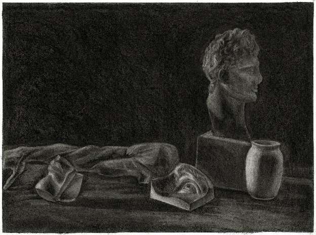 A charcoal still life of a classical portrait bust on a plinth beside a ceramic jug, with draped cloth and a plaster fragment on the table before them, lit against a deep black ground.