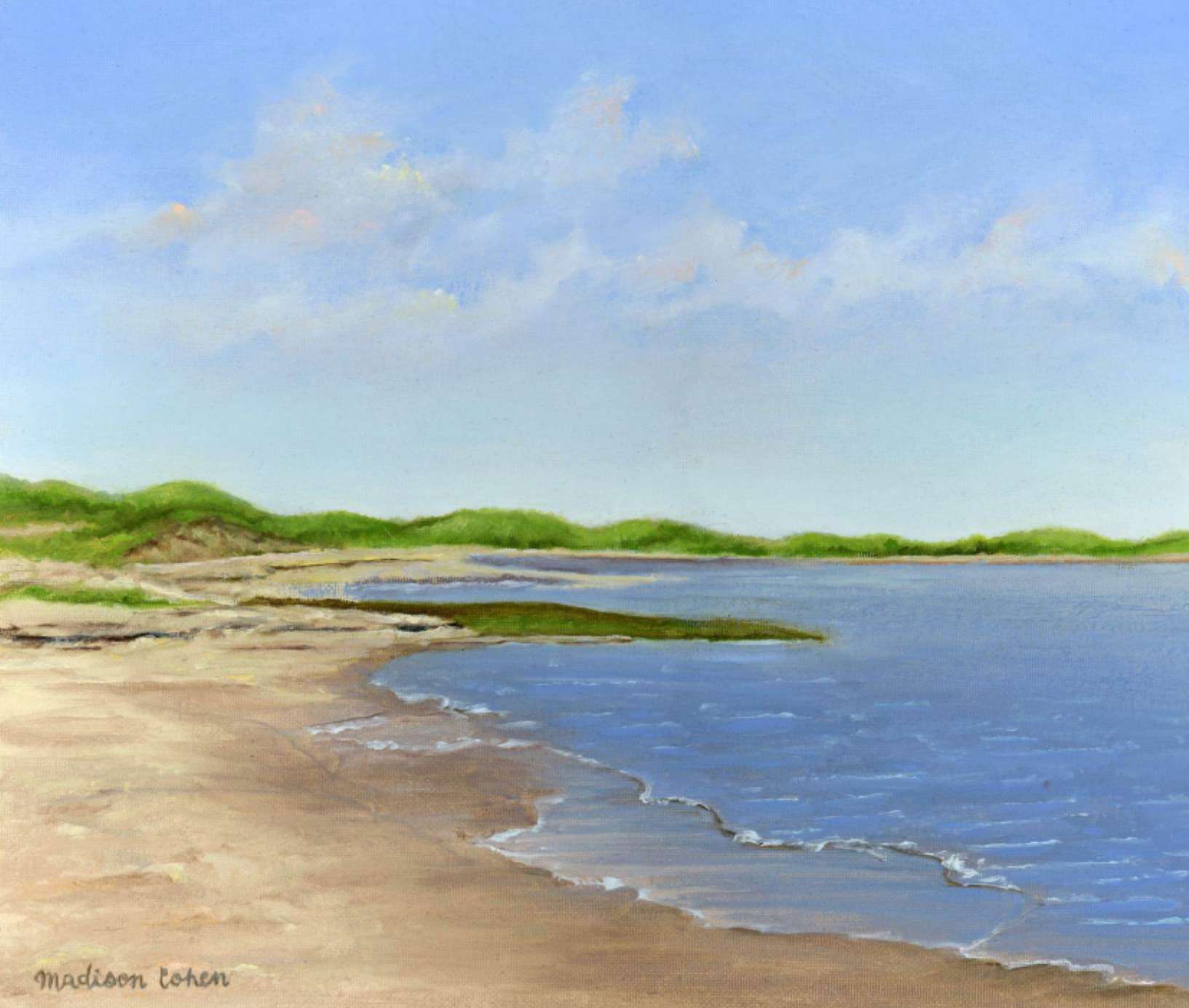 A quiet shoreline where a shallow tidal channel curves between a sandy beach and low green dunes beneath a soft blue sky.